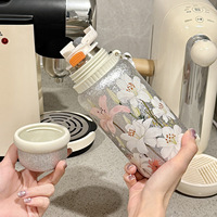 Nouvelle bouteille isotherme en titane à double paroi en acier inoxydable, magnifique bouteille d'eau à fleurs pour femmes