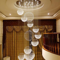 Lustre moderne en cristal K9 pour escalier, grand et long, avec pendentifs suspendus, idéal pour villa duplex, hôtel, en forme de goutte de pluie, en spirale, avec éclairage à intensité variable