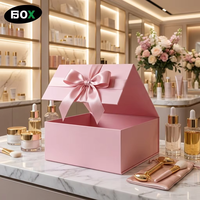 Boîte rigide pliable magnétique personnalisée en ruban rose mat noir écologique pour l'emballage de cosmétiques et de soins de la peau