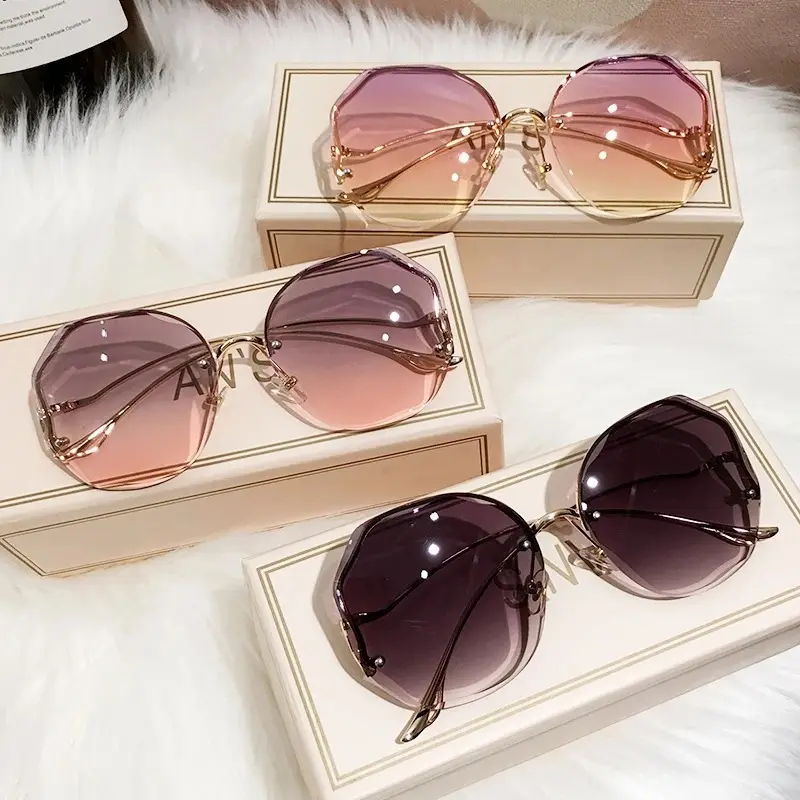 Yiwu Shades lunettes de soleil vendeur femmes femme Occhiali Da Sole mode luxe UV400 dégradé sans monture diamant coupe lunettes de soleil