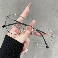 Lunettes anti-lumière bleue unisexes vintage rondes en métal avec design léger et verres transparents en PC pour écrans d'ordinateur