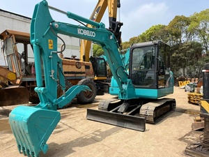 Mini-excavatrice Kobelco SK60 avec godet de terrassement d'une capacité de 0,12 m³, poids opérationnel de 6 tonnes, moteur Kawasaki, modèle Geospec - Product Image 2