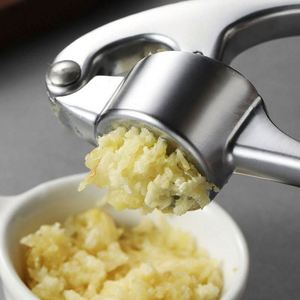 Easy to Squeeze Handle Kitchen Premium Garlic Press with Silicone Garlic Peeler and Cleaning Brush - Product Image 5