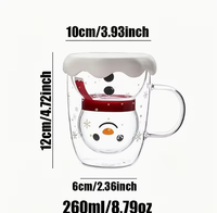 Tasse en verre à double paroi Père Noël avec poignée transparente, couvercle en forme de boule de neige et motif flocon de neige