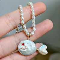 Nuevo Collar con Colgante de Pez de Perlas Naturales de la Serie Océano, Joyería de Pez Besándose del Mundo Marino, Regalo