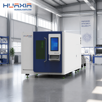 Machine de découpe laser à fibre entièrement fermée avec table d'échange pour tôles, découpeuse laser CNC pour métaux, optimisation de la découpe Yaskawa AI