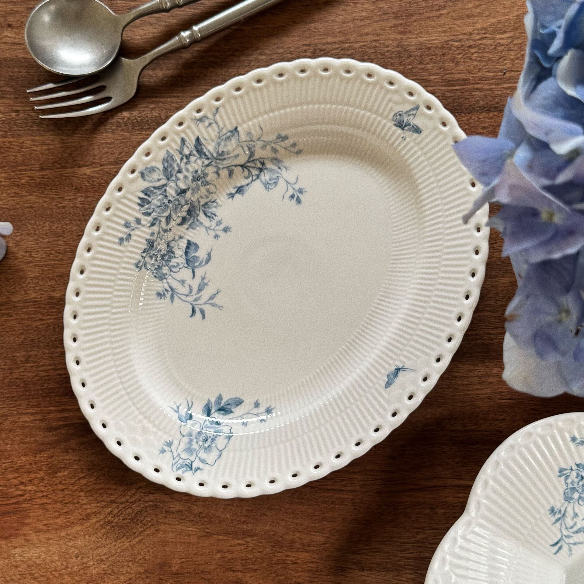 Disque ovale fleur bleue-252015cm