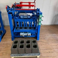 Machine portable de fabrication de briques en ciment, type à vibration et compactage, pour la production de blocs de béton emboîtables et creux