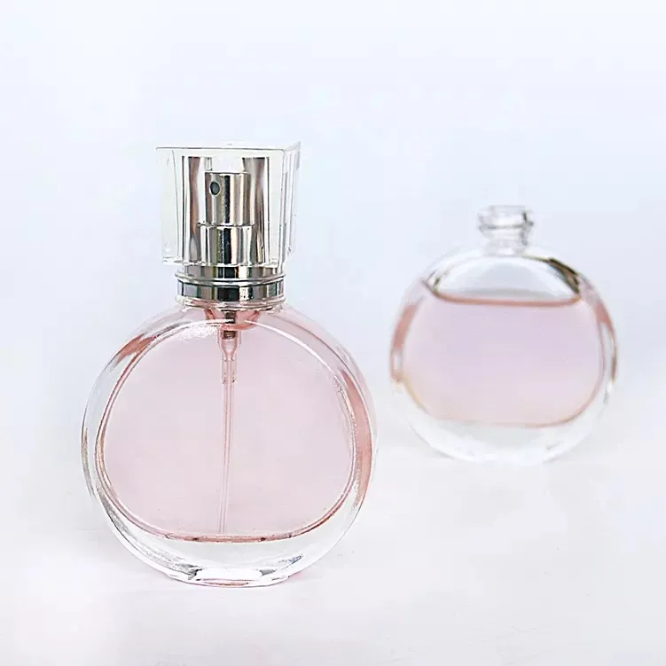 Bouteille de parfum ronde en verre Recyclable de 25ml avec pompe de pulvérisation