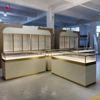 Vitrine à bijoux de luxe sur mesure Sundo, cadre doré moderne, éclairage LED en verre, comptoir mural pour magasin de bijoux