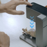 Machine de moulage par injection de bureau et graveur laser combinés pour la petite fabrication