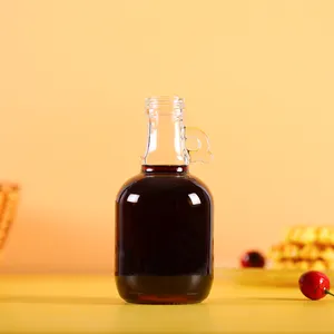 Bottiglie di vetro per la conservazione degli alimenti 1 litro 500ml di salsa vuota rotonda gallone brocche di sciroppo d'acero personalizzate con manico ad anello
