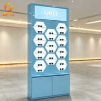 Support d'affichage élégant pour lunettes de soleil noires, avec éclairage LED hexagonal pour magasin d'optique