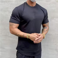 T-shirt d'entraînement amincissant sportif à col rond et ourlet arrondi, manches courtes, en coton 180g, séchage rapide, couleur unie, pour l'été, mettant en valeur les muscles