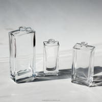 Flacon de parfum rectangulaire de luxe en verre transparent 50 ml avec bouchon doré/noir, flacon pulvérisateur de parfum vide, étiquette personnalisée pour l'emballage de parfums
