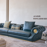 Canapé modulaire en cuir de luxe italien au design original, avec boutons, pieds en acier inoxydable et rembourrage en éponge, idéal pour hôtels et villas.
