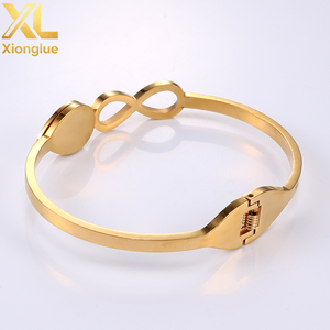 Bracelets ouvrants tendance en acier inoxydable plaqué or 14 carats avec motif cœur et serti griffe, bijoux unisexes pour fêtes et usage quotidien - Product Image 4