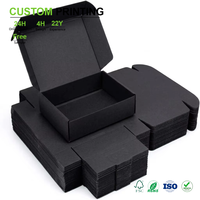 Boîtes d'expédition en carton ondulé noir mat imprimées sur mesure, style fermeture à languette, emballages plats vierges, boîtes d'expédition en vrac pour le commerce électronique et la vente au détail