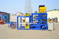 Machine à fabriquer des blocs de béton semi-automatique QT4-26 avec empileur automatique, 4 blocs par moule, plateforme vibrante 50KN
