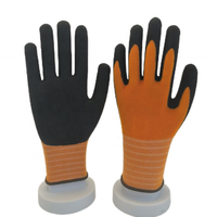 Usine en gros 15G Orange/noir Nylon et Spandex doublure NBR Sandy Palm Coating gants pour industriel
