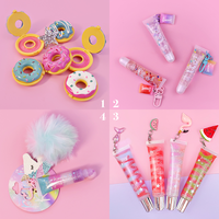 Volume personnalisé en plastique Squeeze Lipgloss Tubes Private Label DIY Cute Keychain Lip Balm Packaging Lipstick Charm Accessories