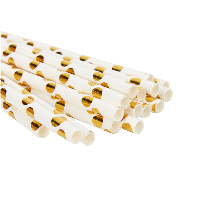 25 pajitas con puntos dorados sobre fondo blanco.