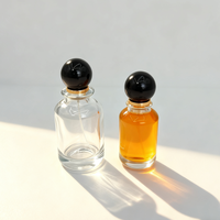 Flacon de parfum en verre cylindrique d'inspiration vintage avec pulvérisateur à pompe circulaire, atomiseur à pression, vente en gros, directement de l'usine