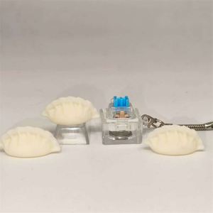 Porte-clés anti-stress créatif et unique en forme de dumpling avec base transparente, clé de décompression pour soulager le stress - Product Image 2