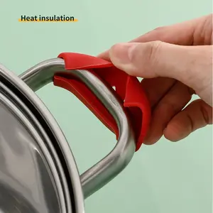 Juego de 2 protectores de silicona para asas de ollas, aislantes del calor, antideslizantes y resistentes al calor, accesorios de cocina - Product Image 4