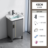 Meuble de salle de bain autoportant en aluminium gris spatial avec lavabo en céramique monobloc et plan de toilette intégré