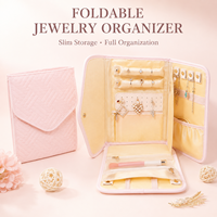 Organisateur de bijoux de voyage simple et élégant en cuir PU matelassé pliable avec porte-bagues, crochets pour colliers et poches zippées – Vente en gros