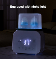 Stérilisateur-sécheur à vapeur multifonction pour biberons Baphiya avec matériau PP, puissance 500W, garantie 1 an pour les produits pour bébés