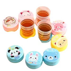 Mini taza de agua mágica plegable para niños, botella de mano portátil de café al aire libre de Color retráctil de silicona de viaje para niños