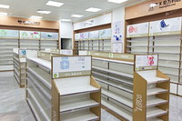 10-YMQSS001-P Vitrine de pharmacie avec éclairage LED, finition stratifiée durable et écologique pour l'affichage en magasin de médicaments