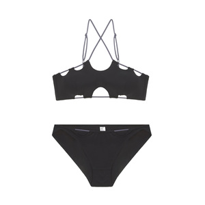 Conjunto de lencería sin costuras con tiras cruzadas, transpirable, ultrafino, sujetador sin tirantes y bragas. - Product Image 1