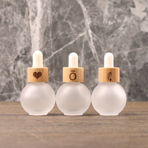 Schöne kugelförmige Tropf flasche aus Glas 20ml 30ml ätherisches Ölglas mit Bambus deckel Kostenlose Probe für Hautpflege serum - Product Image 1