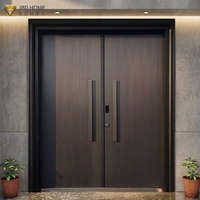 Porte de sécurité en acier inoxydable noir au design moderne avec fonction antivol pour usage extérieur dans les villas et appartements