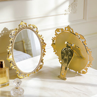 Miroir de poche cosmétique rétro sculpté haute définition portable avec cadre en plastique rond tactile