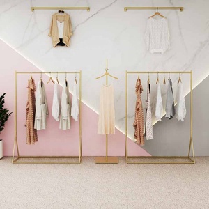 OEM boutique en acier inoxydable or vêtements support mural <span class=keywords><strong>Table</strong></span> gigogne vêtements étagère vêtement présentoir - Product Image 3