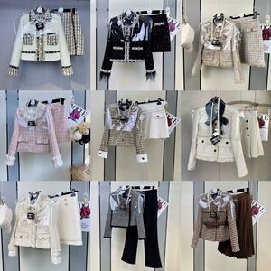 <span class=keywords><strong>Giacca</strong></span> monopetto da <span class=keywords><strong>donna</strong></span> a scacchi <span class=keywords><strong>Tweed</strong></span> a 2 pezzi con decorazione a bottoni e Set gonna corta - Product Image 1