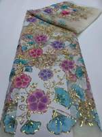 Tissu en dentelle française élégante de haute qualité avec perles faites à la main et maille à sequins pour la création de robes de mariée et de soirée.