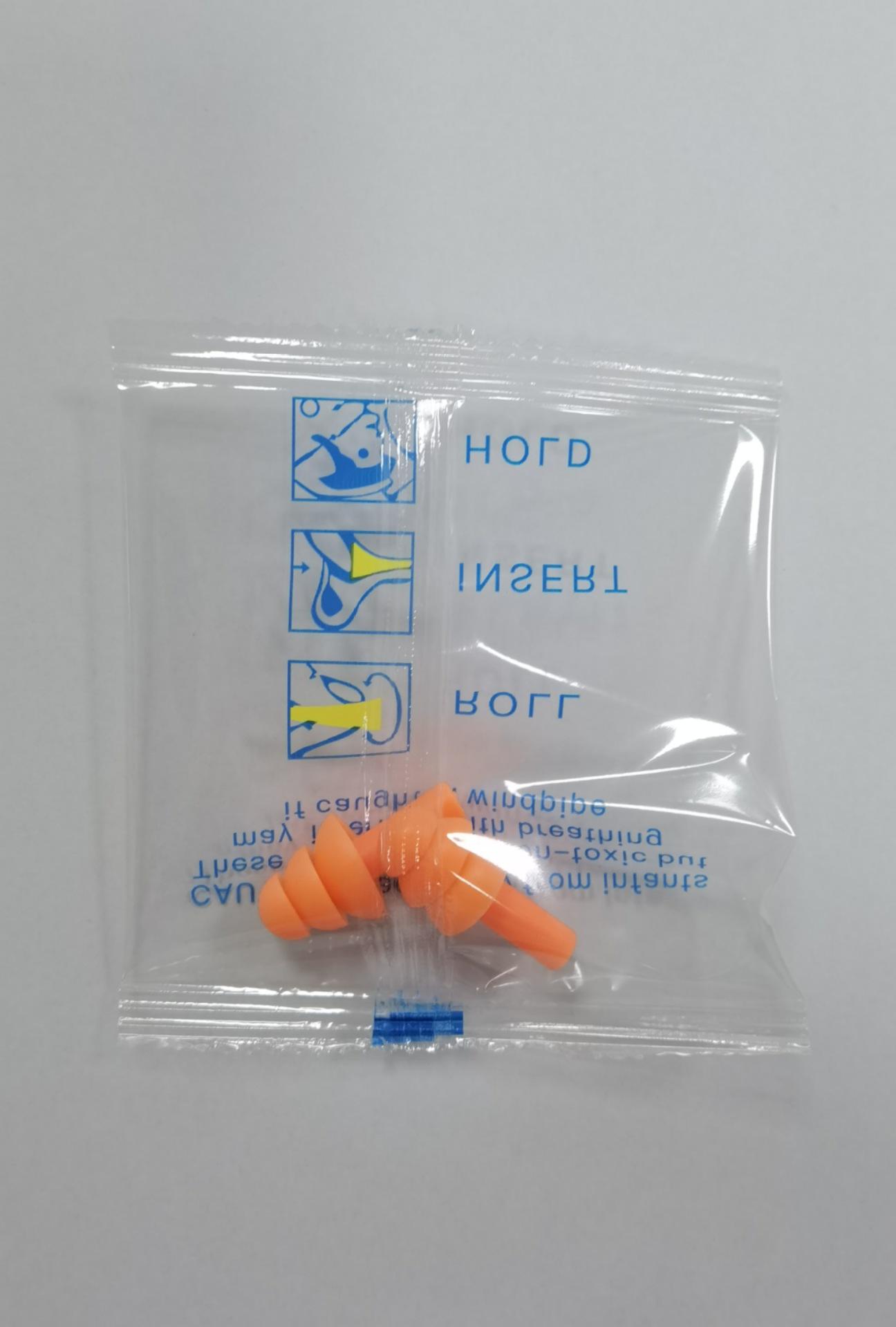 ที่อุดหูสีส้มแดงในกระเป๋าหนึ่งคู่