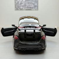Nouvelle voiture miniature BMW M4 à l'échelle 1:32 en alliage avec son et lumière, fonction de recul avec son et lumière, modèle de voiture en métal