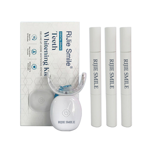 Kit Sbiancante per Denti Ricaricabile Wireless RIJIE <span class=keywords><strong>SMILE</strong></span> per Uso Domestico Sicuro, 32 Luci LED Blu e Rosse, Penna Gel Senza Perossido, Portatile e di Lusso - Product Image 1