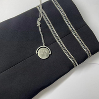 Pendentif à illusion optique tournant « Je t'aime » en acier inoxydable. Collier avec inscription tournante, collier spinner