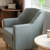 Minimalistischer Cremefarbener Stoffsessel, Ergonomischer Einzelsessel mit Umhüllter Rückenlehne und Leichtem Massivholzbein für Innenräume
