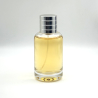 Bouteille de parfum rectangulaire personnalisée de 100ml avec pulvérisateur à pompe en verre vide et bouchon en plastique en forme de cylindre