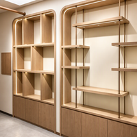 Vitrine de magasin de jouets pour enfants personnalisée avec étagères murales arquées à LED et comptoir îlot à niveaux – Solution d'aménagement de boutique