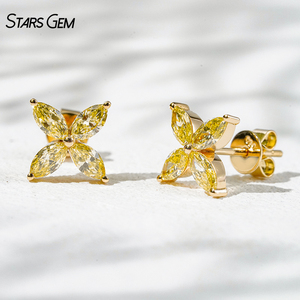 Boucles d'oreilles clous unisexes vintage Starsgem en or jaune 18 carats avec diamant de laboratoire jaune taille marquise 2,5*5mm 0,95 carat, pureté 75% - Product Image 1