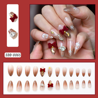 24 faux ongles en acrylique à pression pour Noël, motifs flocons de neige/nœuds, faux ongles à paillettes vertes et rouges pour femmes